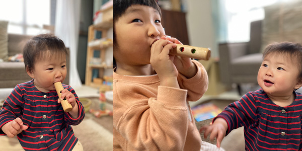 ふえもど木で遊ぶ子供